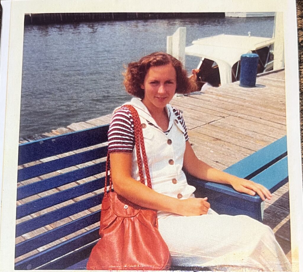 Mom as teenager. In a harbor.